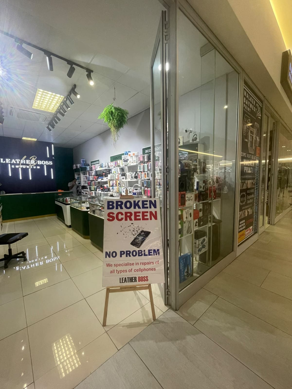 Leather Boss & Cell Phone storefront at Entrance 1, Baywest Mall